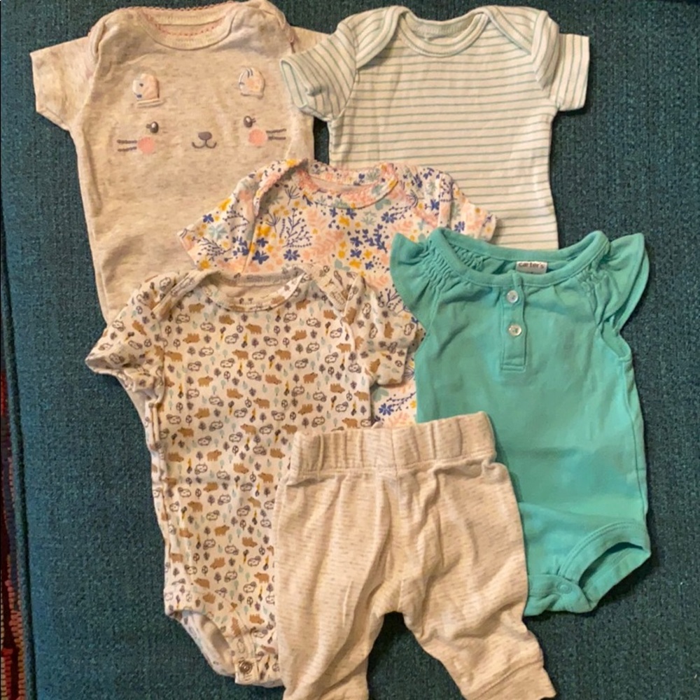 Bundle of newborn clothes